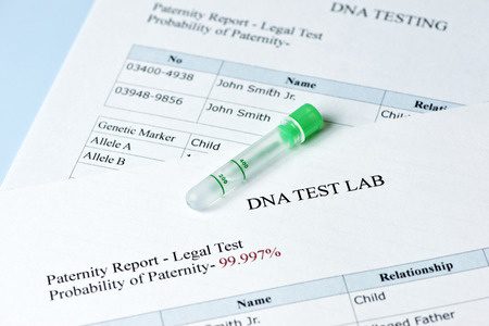 DNA test lab report showing paternity results with a 99.997% probability and a green test tube.