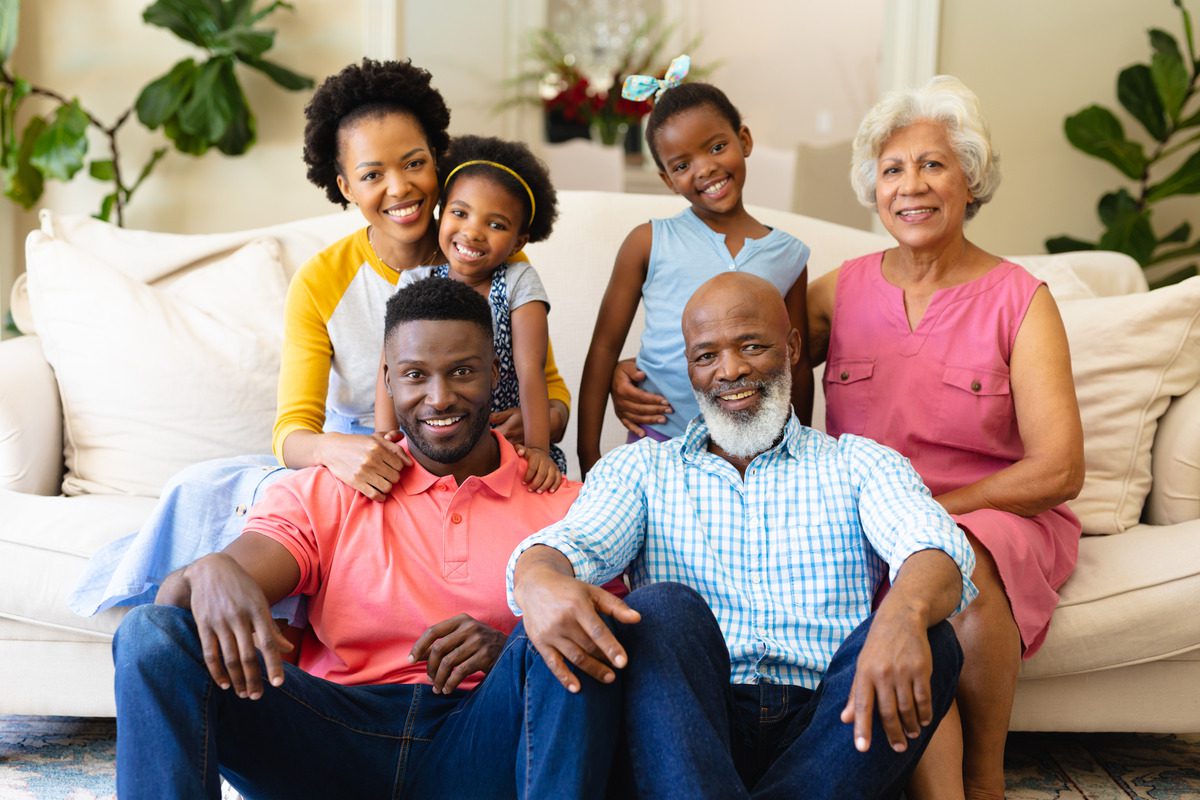 A photo showing multiple generations of a family, such as grandparents, parents, and children. This could help emphasize the importance of protecting family wealth or heirlooms through a prenuptial agreement