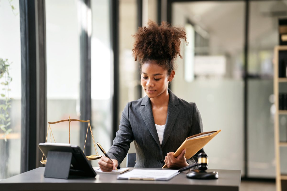 A Lawyer writing notes for a minute order