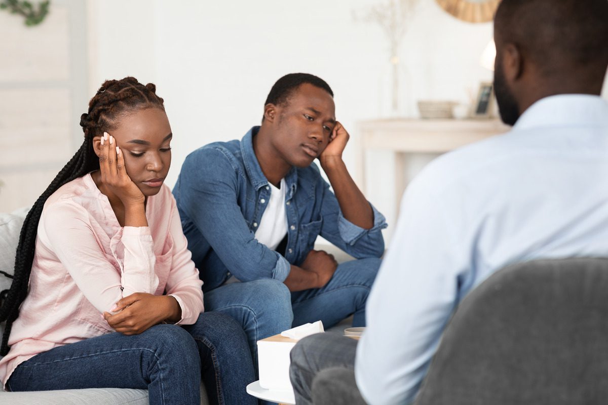 A couple discussing divorce with a psychologist