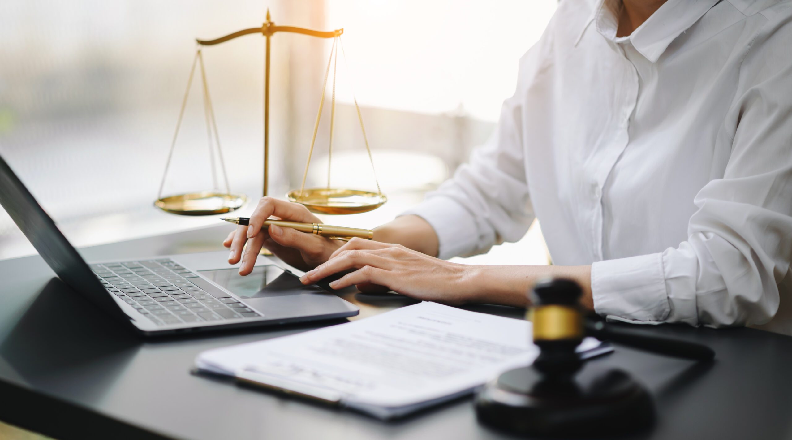 a lawyer working on a laptop
