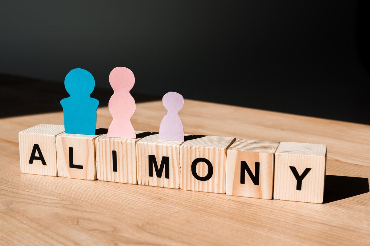 Symbolic representation of alimony and spousal support, illustrating family law litigation, child support calculations, and financial settlements during a divorce