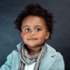 A well-dressed young child representing family law matters such as child custody, parental rights advocacy, and youth legal protection